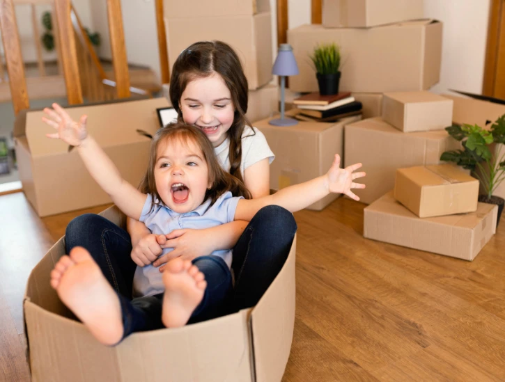 family enjoying moving with kids in abu dhabi
