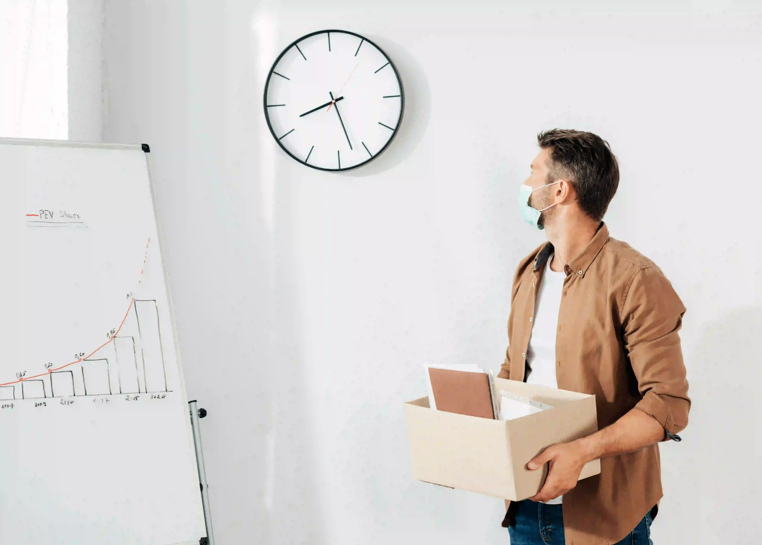 man looking at clock for lasst minute move in abudhabi